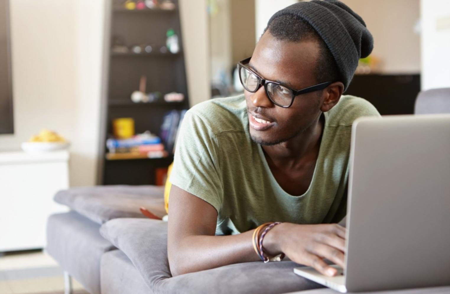 Modern workspace showing analytics dashboard on computer screen with notes and documentation